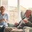 A caregiver provides Memory Care at Home to a senior