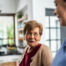 Caregiver provides attentive senior care as part of diabetes awareness